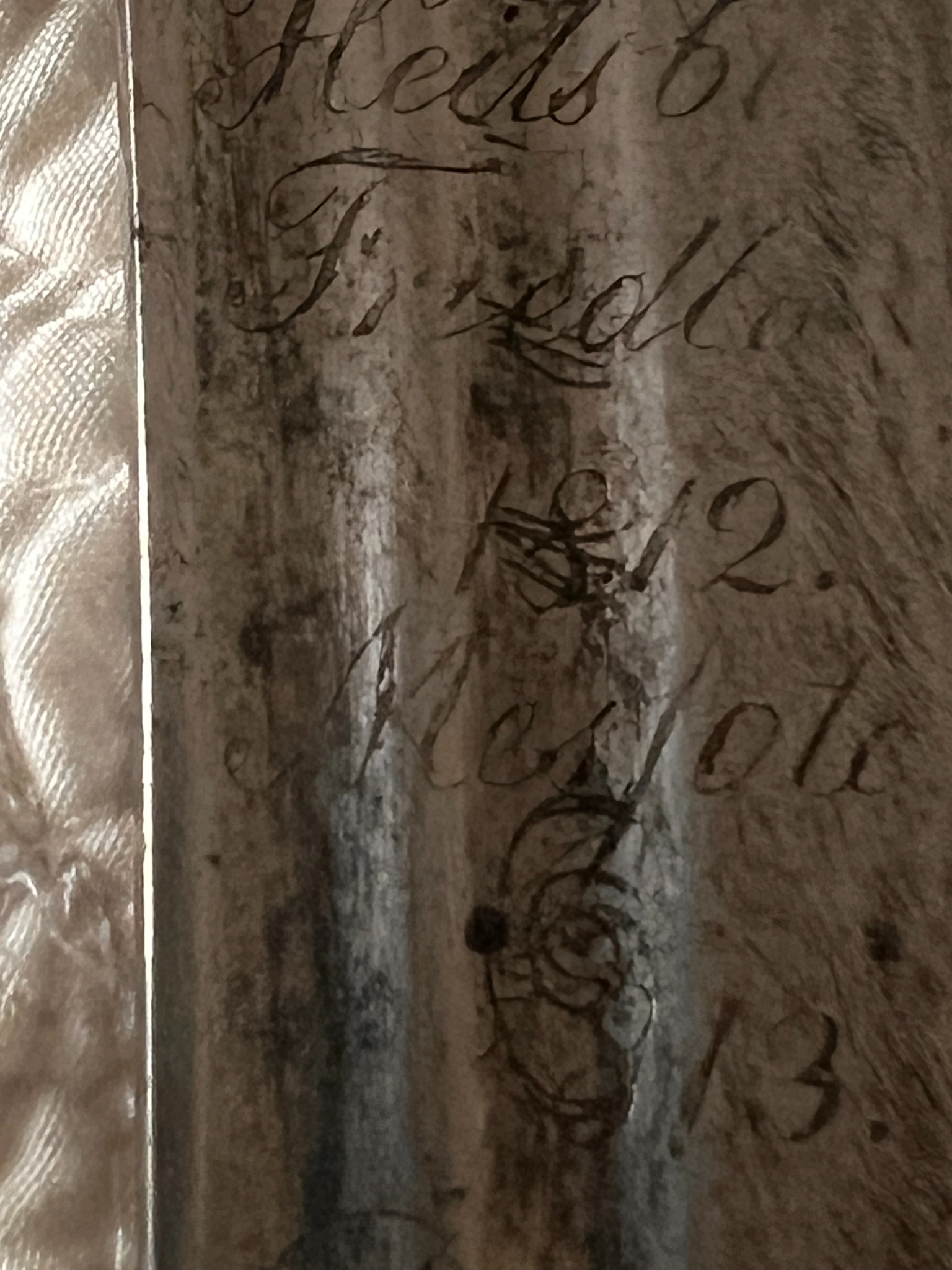 Third overlapping macro photograph of the campaign inscription